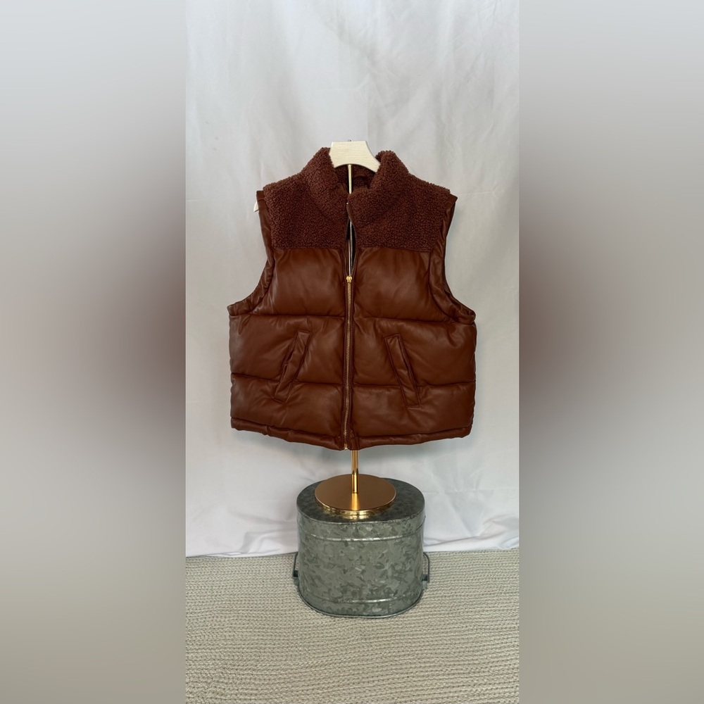 Maurice’s brown leather/sherpa vest